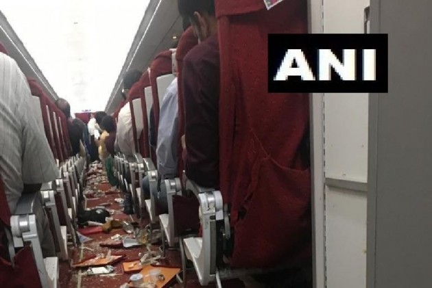 तेज हवा की चपेट में आने से क्षतिग्रस्त हुआ एयर इंडिया का विमान, क्रू मेंबर घायल