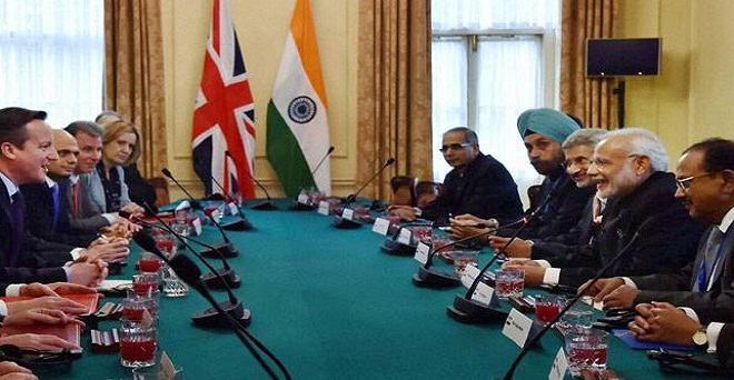 भारत-ब्रिटेन के बीच कई व्यापारिक समझौते, मोदी विरोध भी जारी