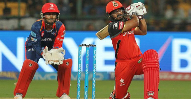 जाधव के अर्धशतक से आरसीबी ने दिल्ली को 15 रन से हराया